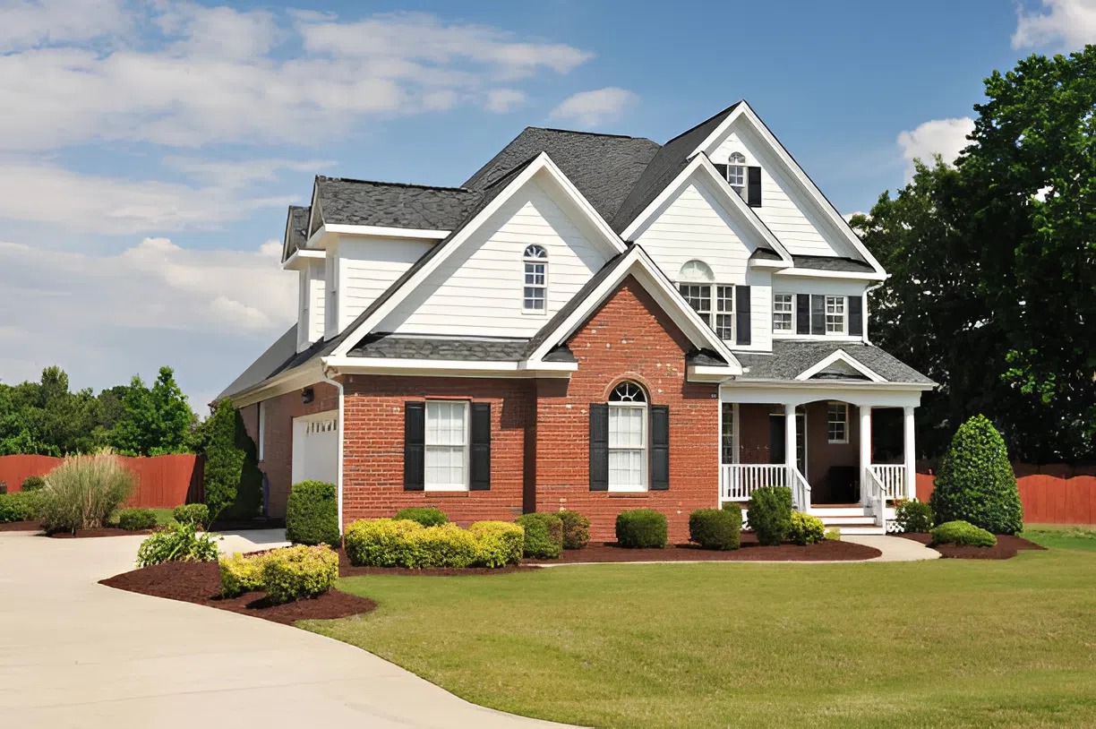 Exterior home with fresh siding and trim by a painting company in Clemmons, NC