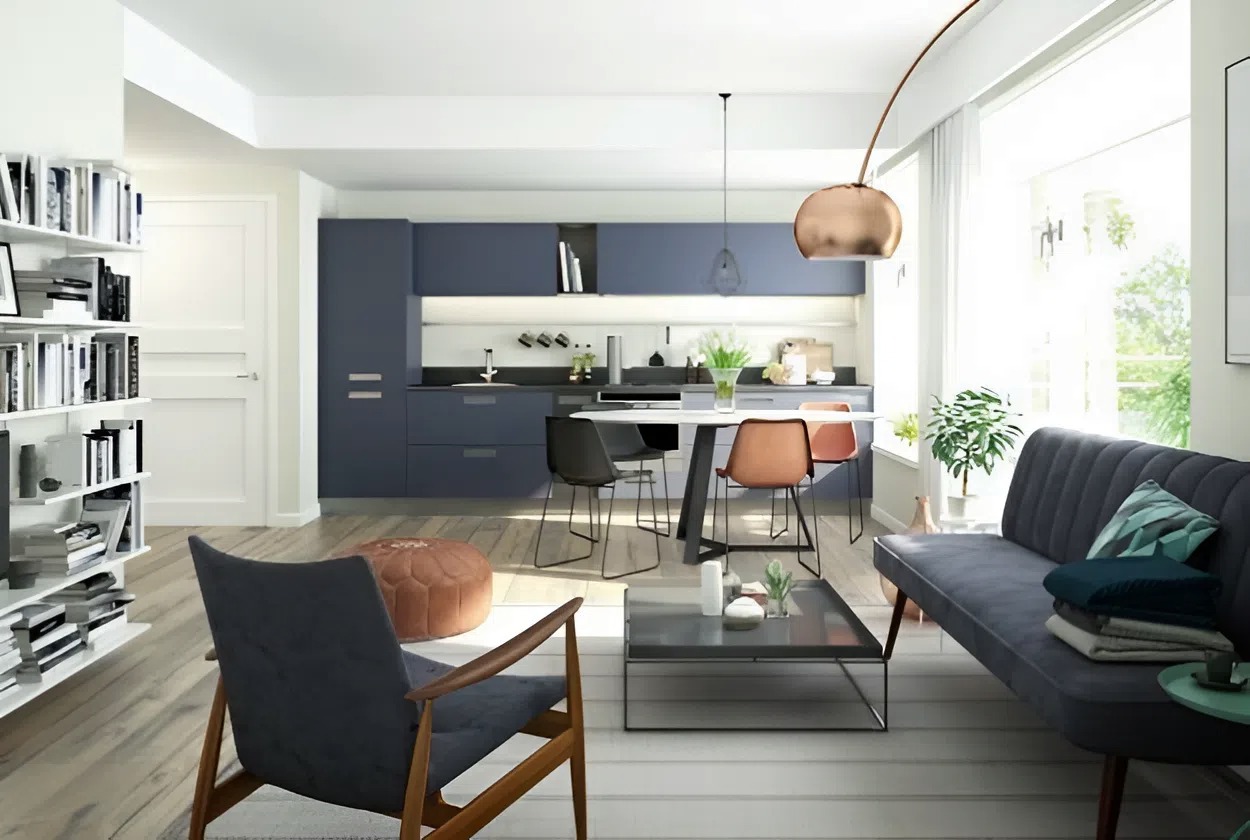 Living room and kitchen with cohesive soft white walls and muted blue cabinetry by a painter in Summerfield, NC