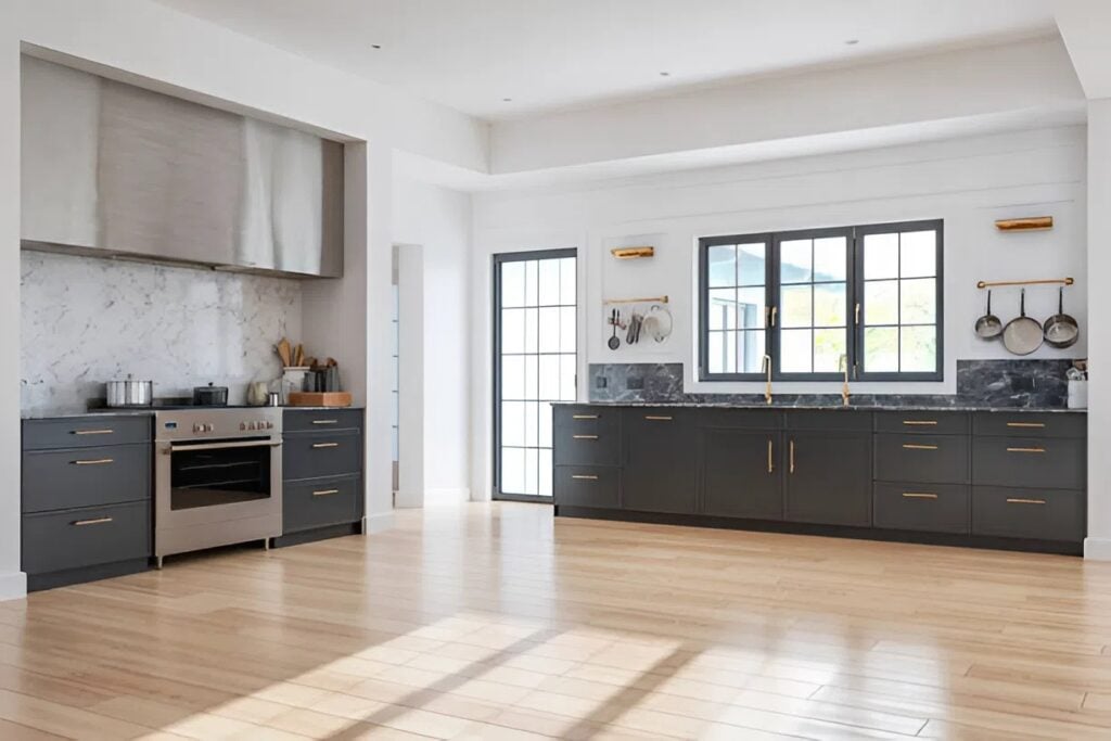 Kitchen with hardwood flooring and contrasting dark cabinetry by an interior painter in Oak Ridge, NC