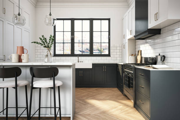 Kitchen with white walls, crisp cabinetry, and black accents by an interior painter in Kernersville, NC.