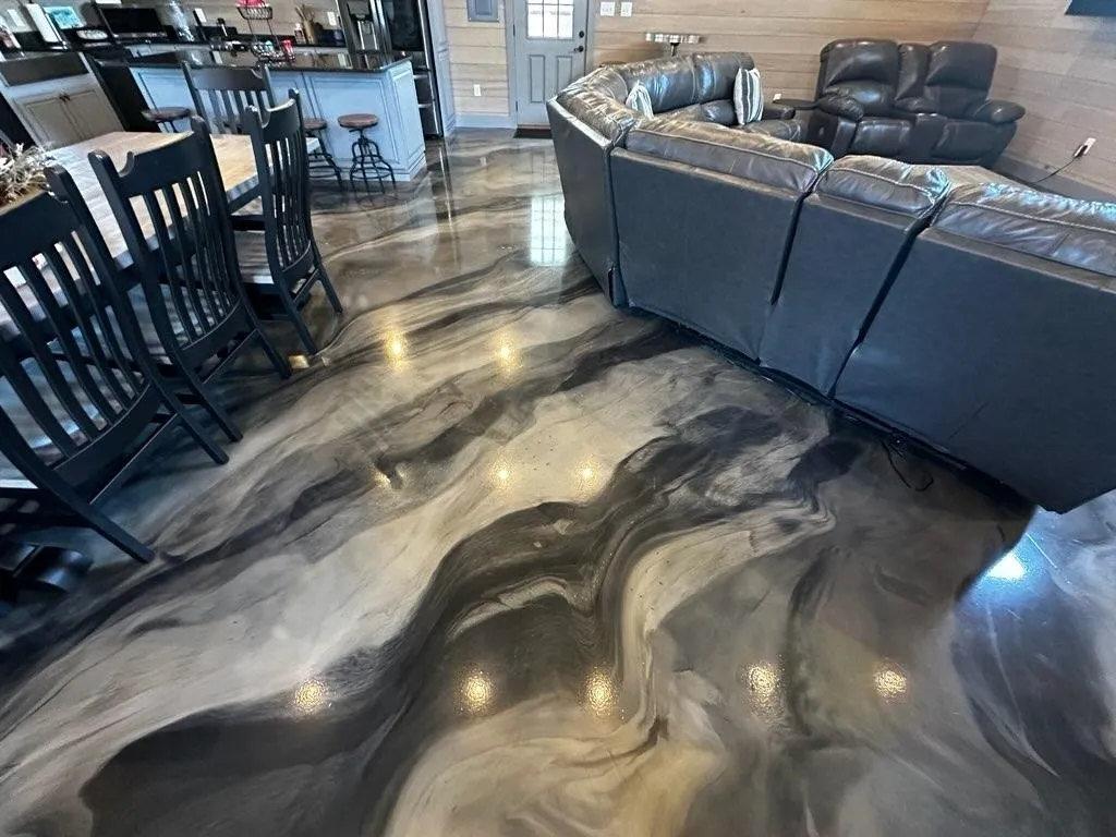 Black and gray metallic epoxy flooring with a high-gloss finish by an interior painter in Lexington, NC.