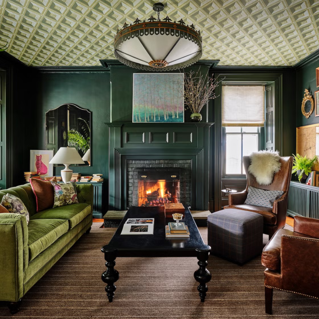 Living room with dark green accent wall and painted trim by an interior painter in Summerfield, NC