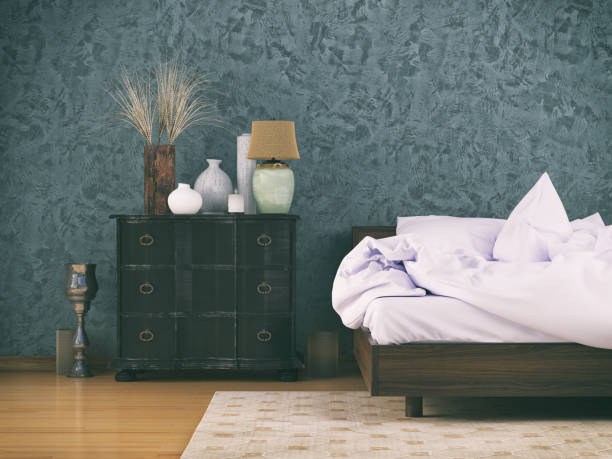 Blue-gray textured walls with a decorative finish and warm wood trim by a painter in Pfafftown, NC